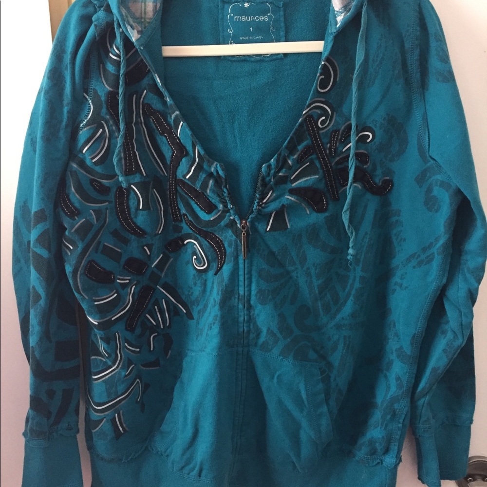 Zip up teal hoodie wi h black and silver detailing